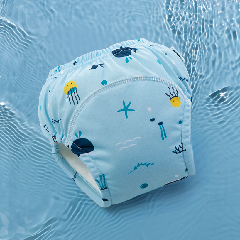 Light blue diaper with ocean-themed print on water