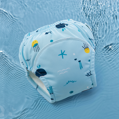 Light blue diaper with ocean-themed print on water